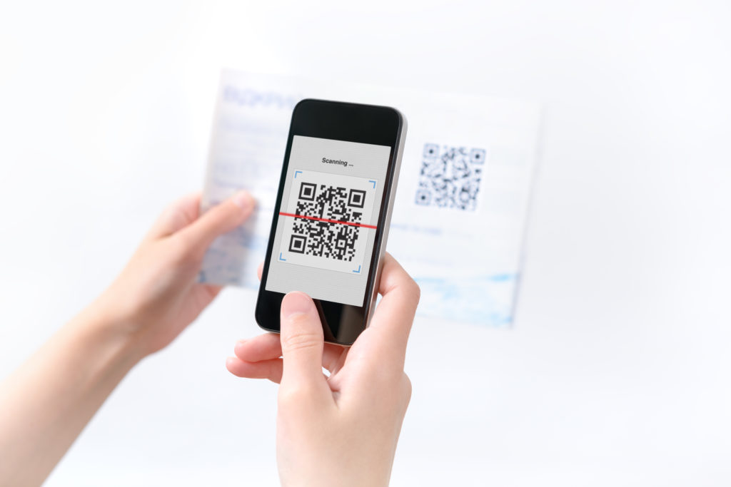 a person is scanning a qr code on their phone