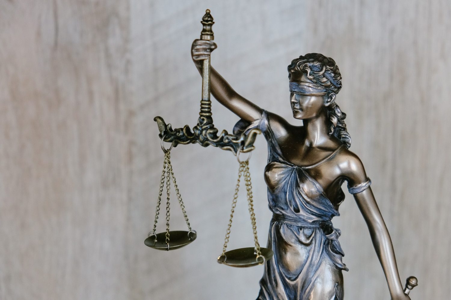Lady Justice holding cool old-timey scales