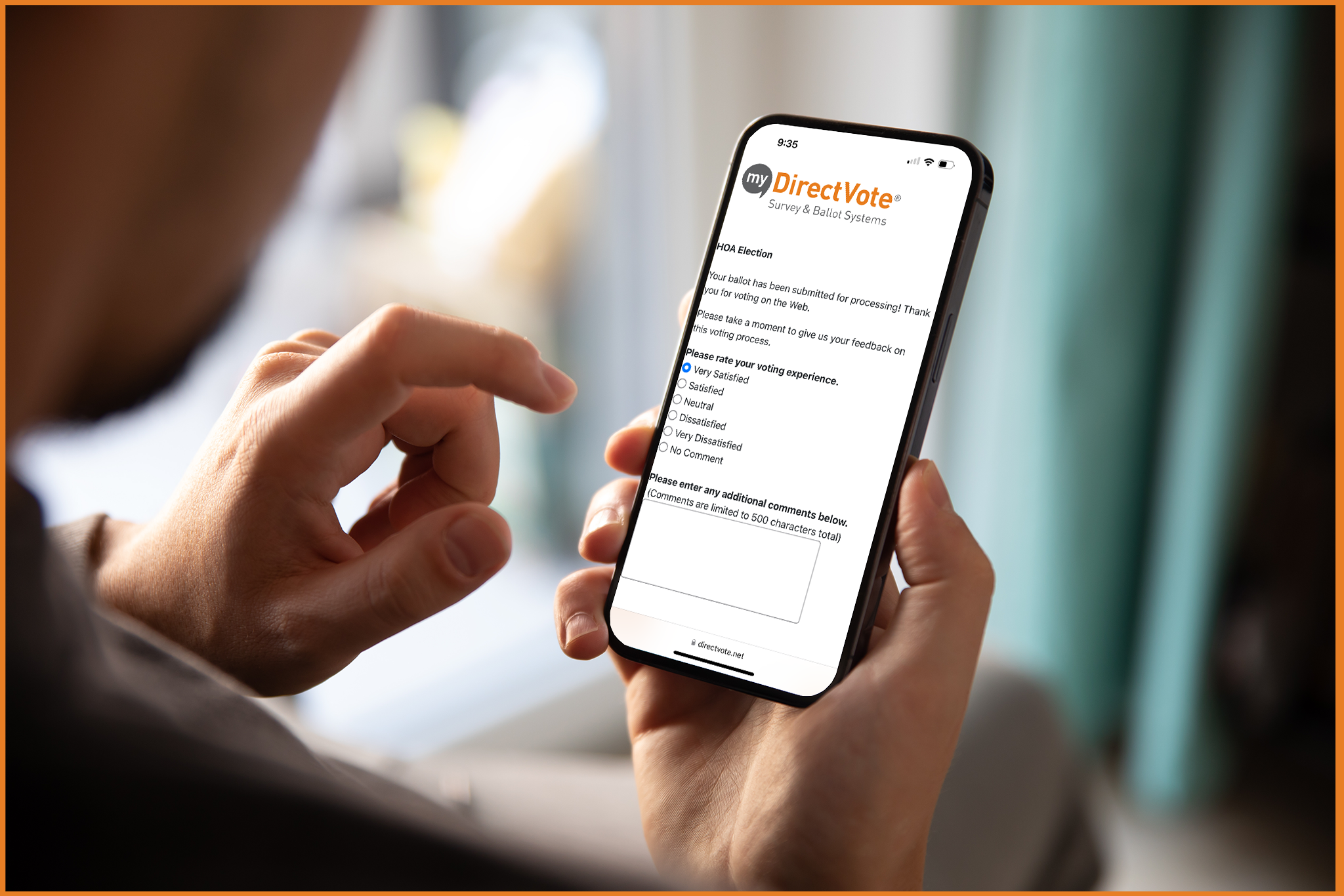 Person holding a smartphone displaying an electronic ballot, with options selected on an online voting form.